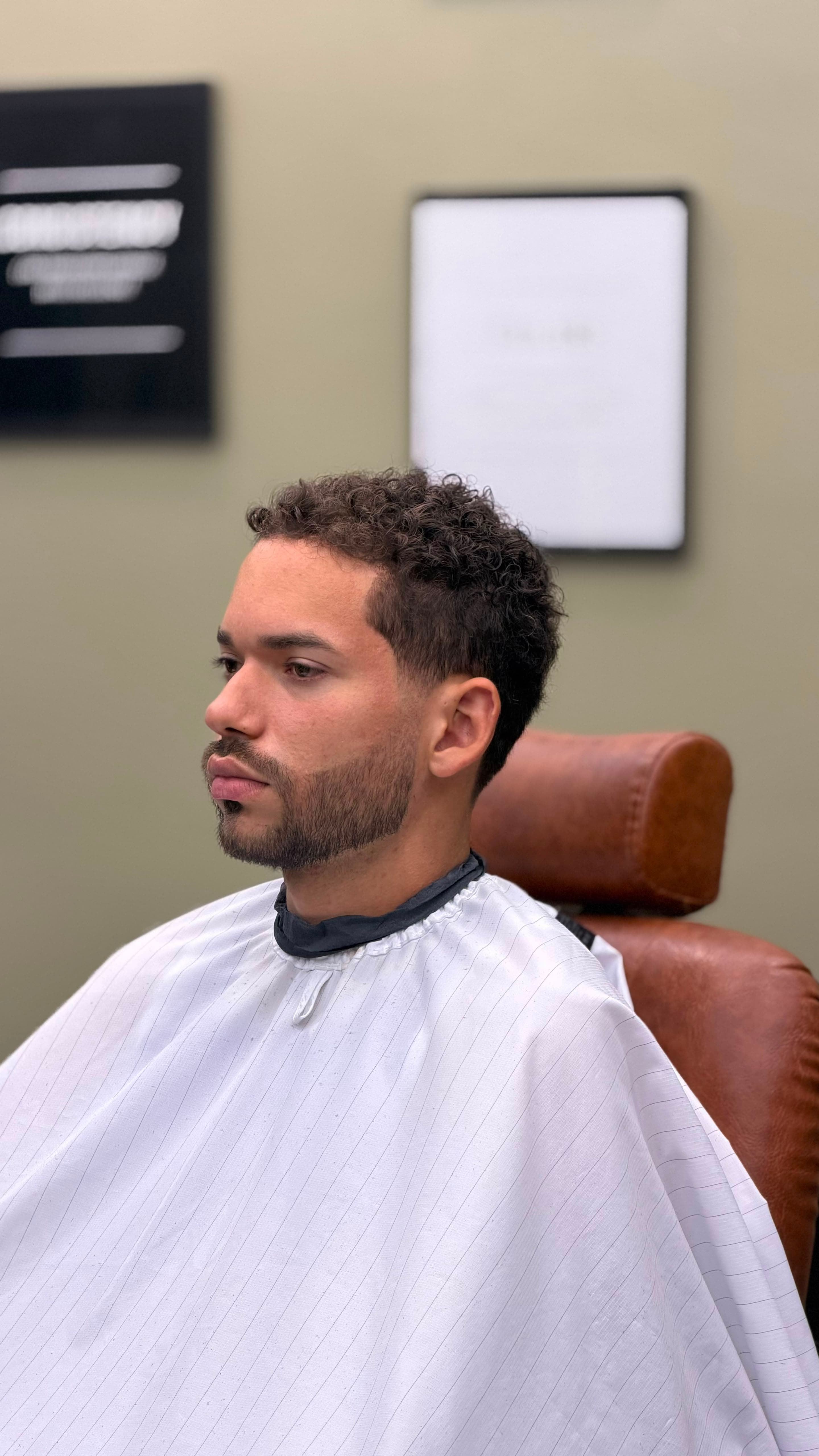 Men's hairstyle at WOLF Barbershop